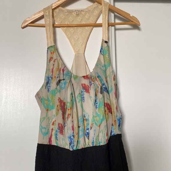 Rachel Roy dress, top flows more loosely and bottom is fitted - Picture 2 of 4